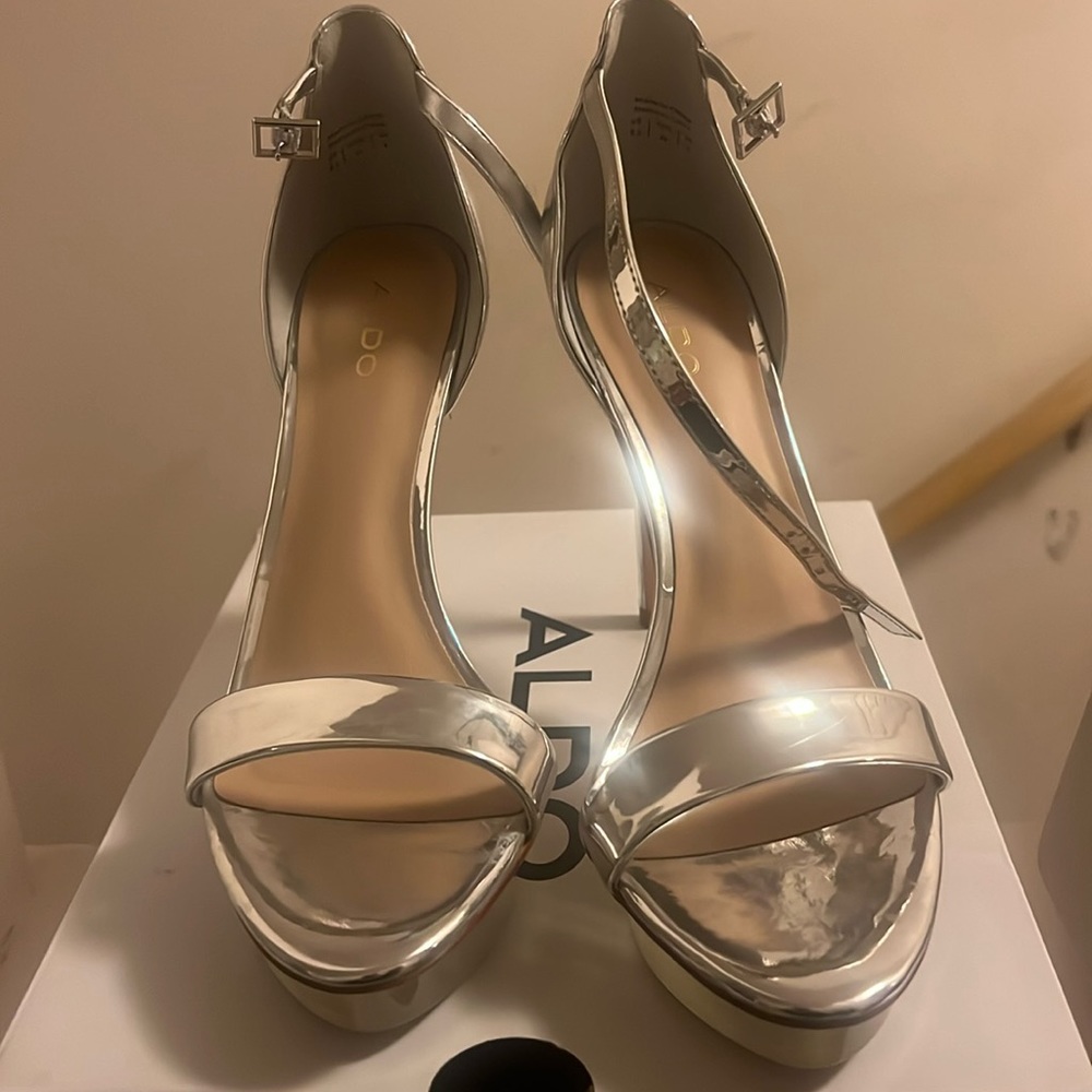 Women's size 8.5 silver heels from Aldo....worn for 2 hours!